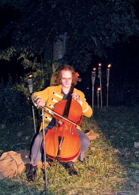 Jan Kavan playing a solo cello piece.